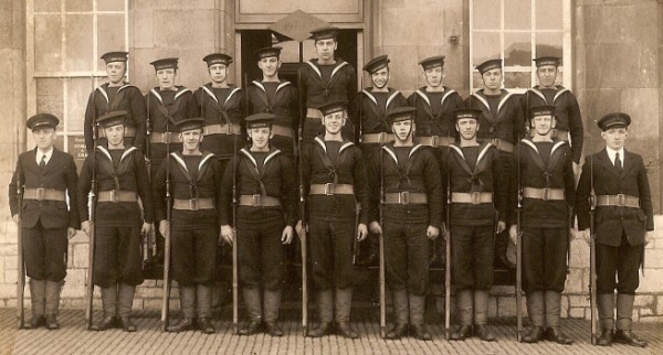 Charlie (front row centre), next to his friend Emrys Thomas (left) whilst in training at Devonport Barracks
